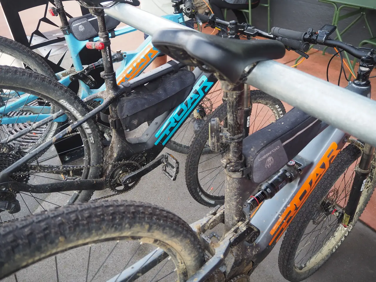 Roar eBikes with bags attached to their frames